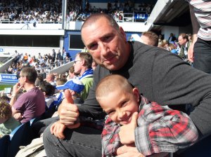 Safely seated: Father and son at QPR, April 4, 2009